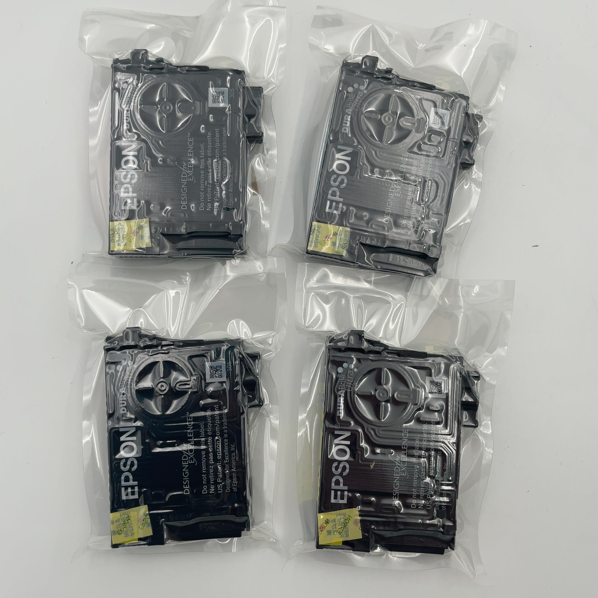 Epson 702 Black C/M/Y 4Pk Combo Ink Cartridges - Black Cyan Magenta Yellow: Standard Yield (Please Be Advised That Sets May Be Missing Pieces Or Otherwise Incomplete.)
