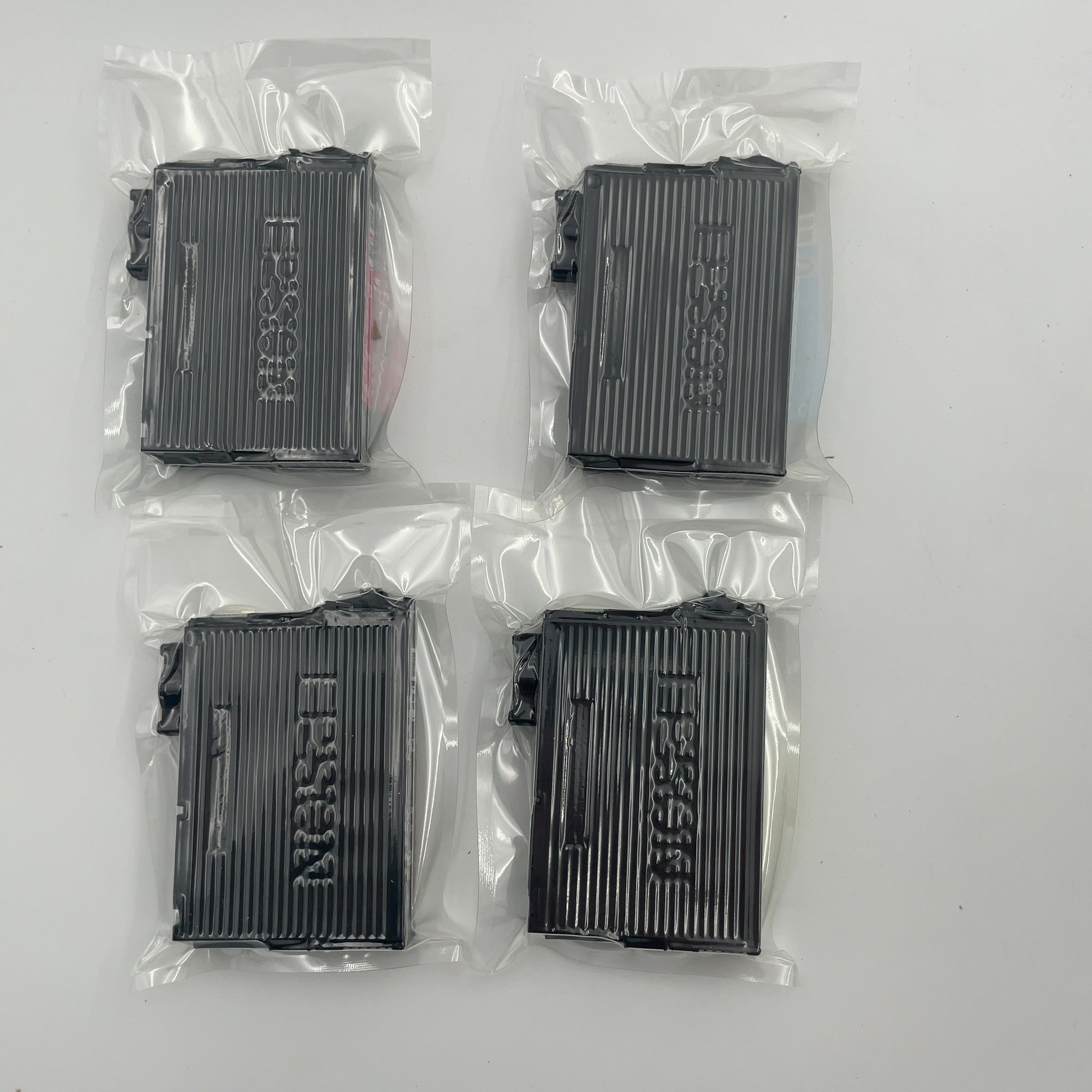 Epson 702 Black C/M/Y 4Pk Combo Ink Cartridges - Black Cyan Magenta Yellow: Standard Yield (Please Be Advised That Sets May Be Missing Pieces Or Otherwise Incomplete.)